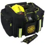black firefighter bag filled with turnout gear and helmet