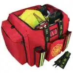 red firefighter bag filled with turnout gear and helmet
