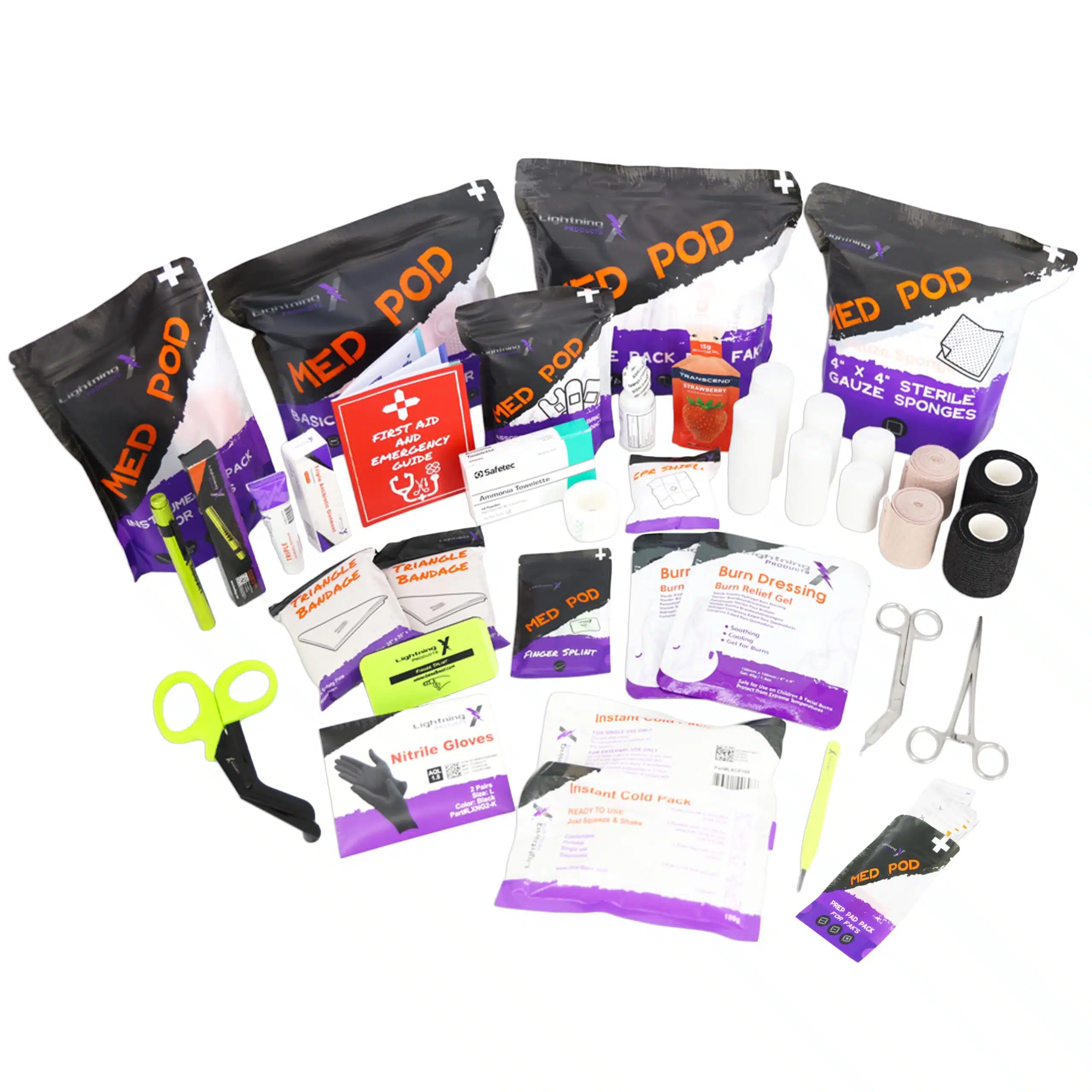 Flat-laid medical kit with Med Pod refill packs, green shears, dressings, bandages and burn supplies
