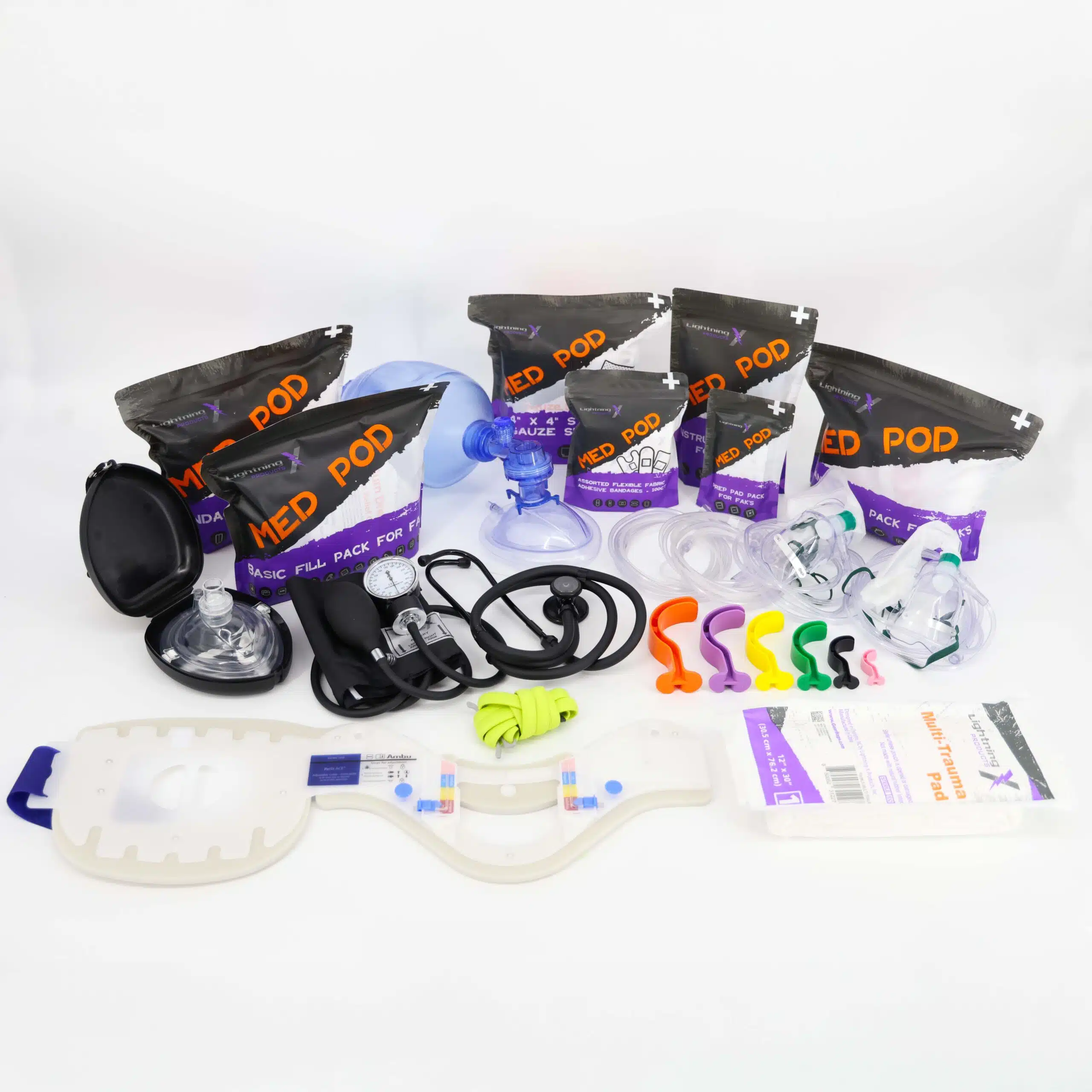 Flat-laid first-responder kit: airways, CPR mask, BP cuff, stethoscope, shears and Med Pod refill packs
