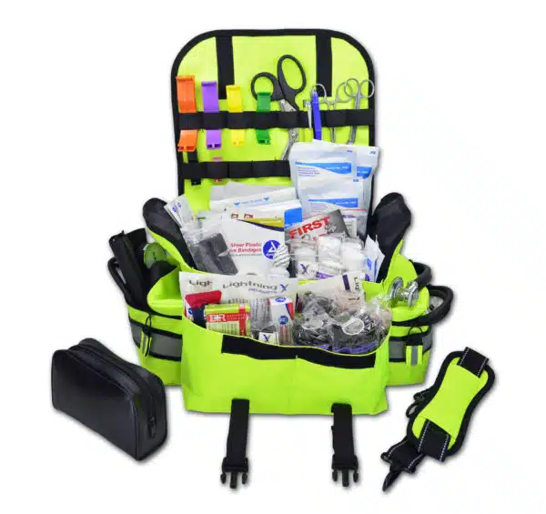 Small EMT first responder bag with reflective striping, padded shoulder strap, multiple zippered compartments, and stocked with basic first aid and trauma supplies including bandages, gauze, shears, gloves, and more. Compact and ideal for emergency medical use in vehicles, schools, or workplaces, available in red, black, blue, orange, fluorescent yellow, purple and pink