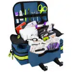 Navy blue Lightning X EMS trauma bag opened flat to show the organized, fully stocked medical supplies