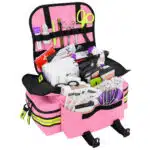 Pink Lightning X EMS trauma bag opened flat to show the organized, fully stocked medical supplies