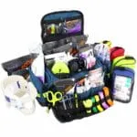Open blue trauma kit with 6 accessory pouches stocked with professional emt supplies