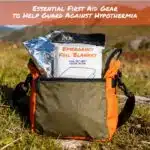 AI-generated image of packaged emergency foil blanket tucked into front pocket of satchel in a grassy field