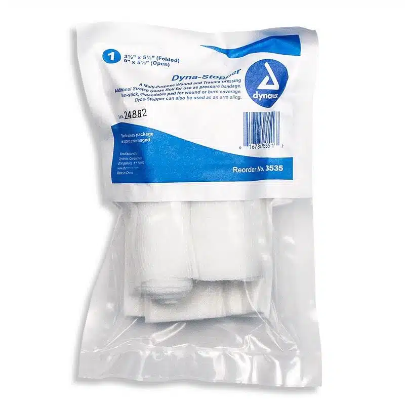 White rolled compressed gauze dressing in sealed pouch