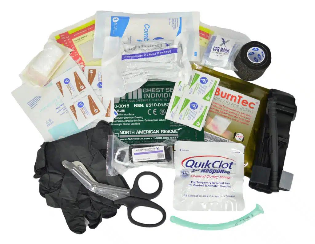 Stocked first-aid module of dressings, gloves, shears and QuikClot