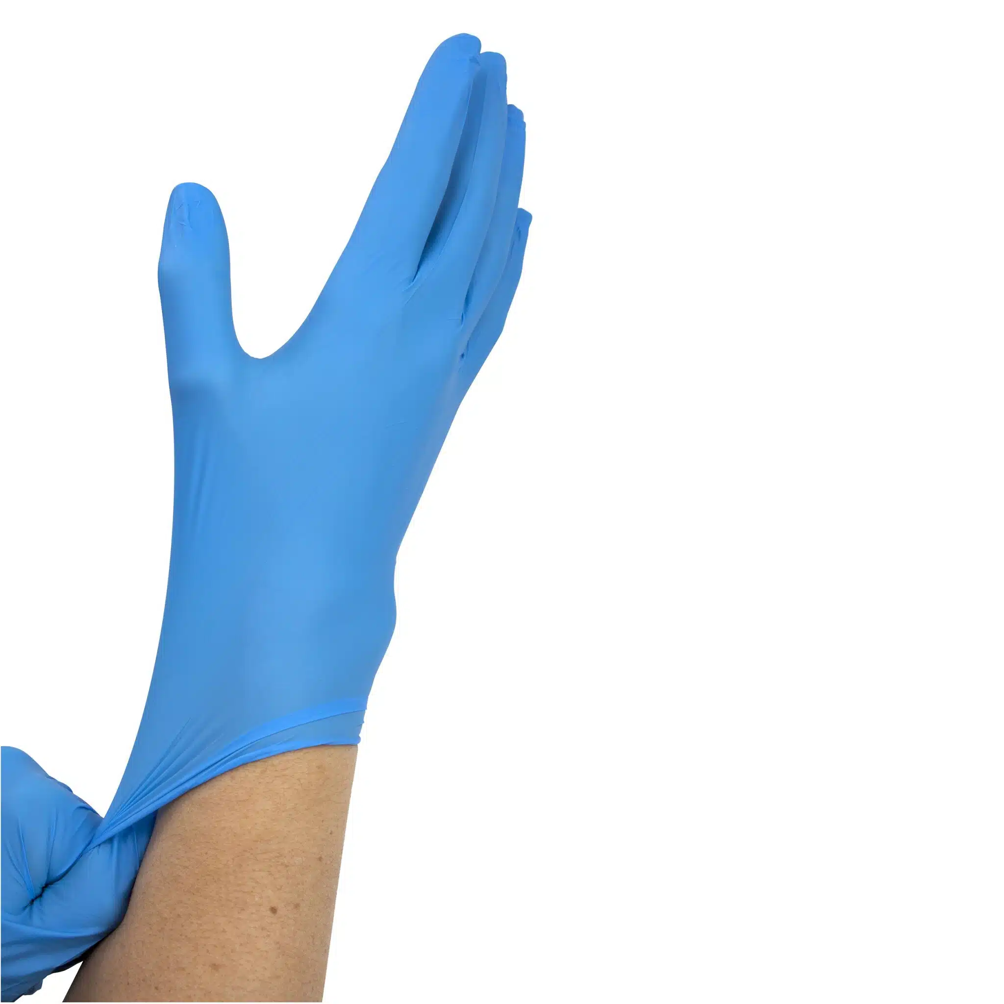 Hand pulling on a blue nitrile disposable exam glove