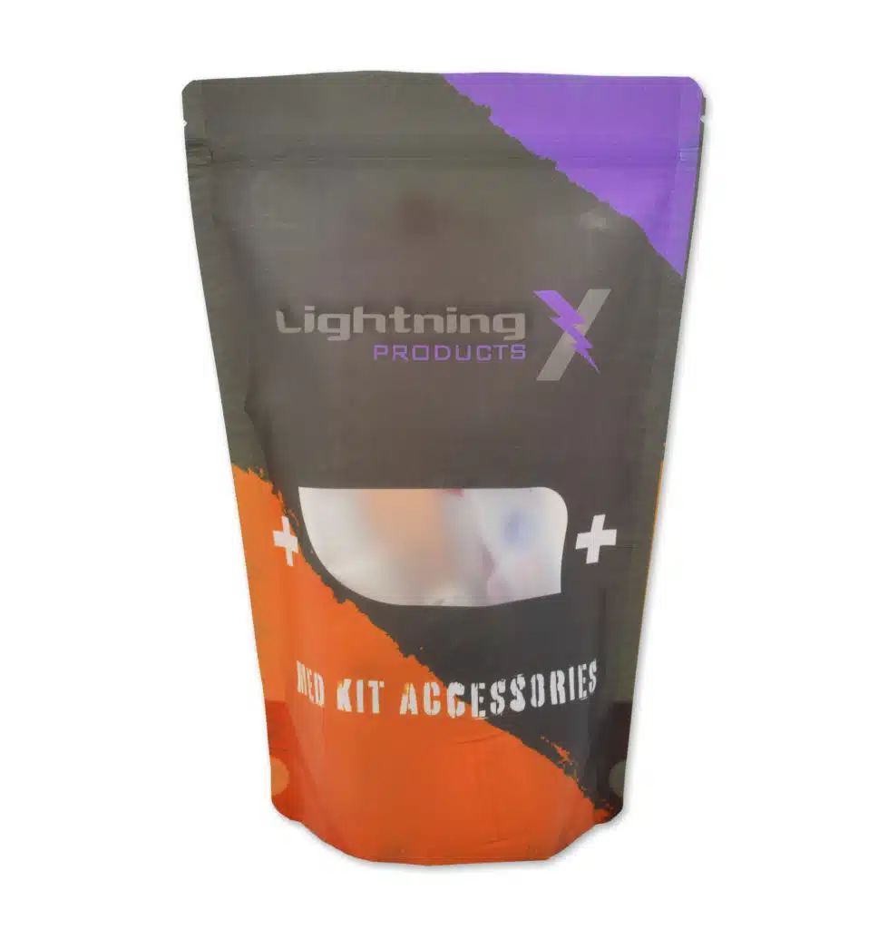 Black and purple resealable pouch of med kit accessories with a window showing topical spray bottles.