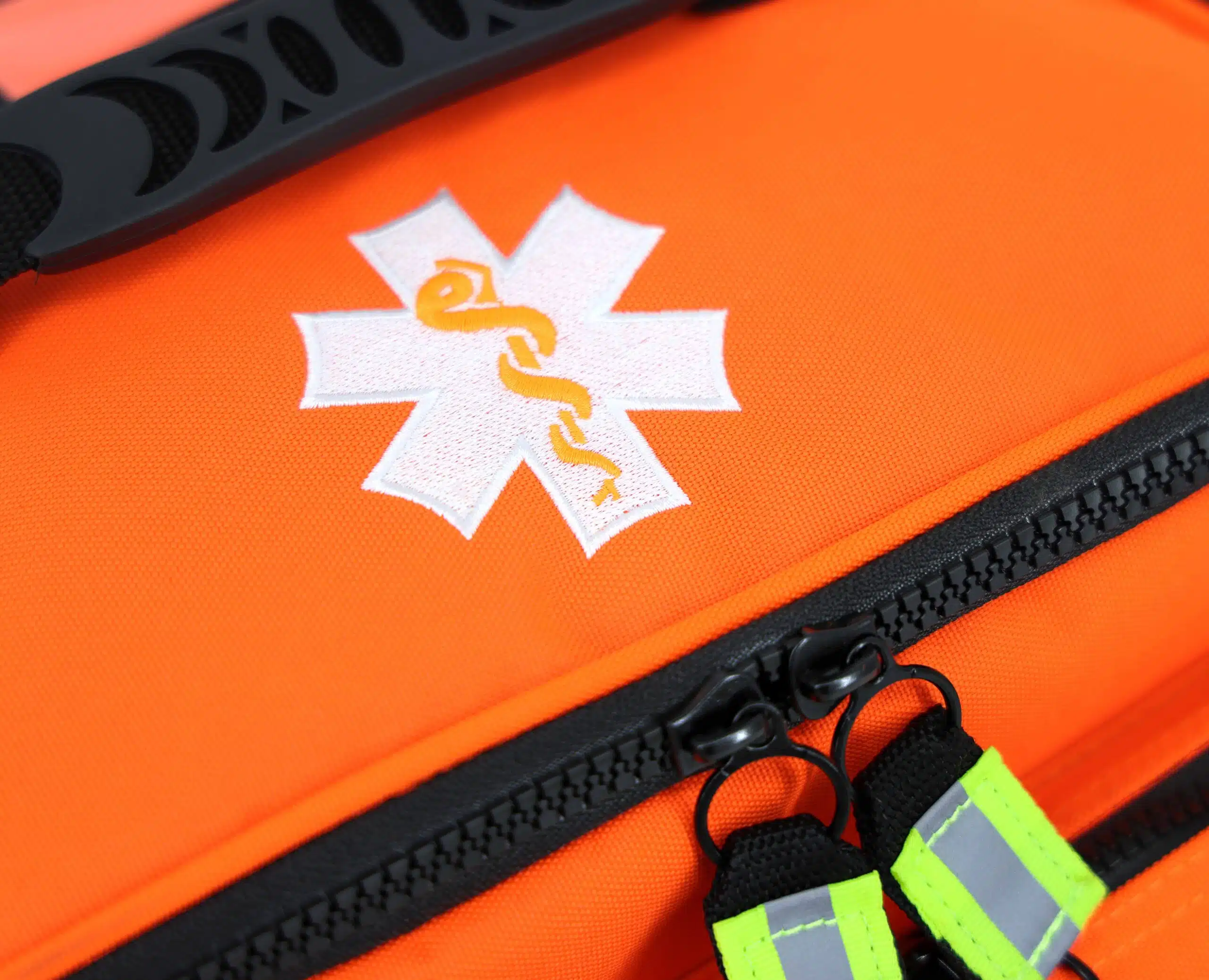 LXMB25O_CLOSEUP_STAR Lightning X Medium First Responder EMT Bag orange reflective zipper pulls star of life embroidery