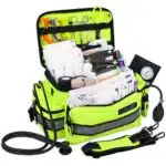 Fluorescent Yellow EMT bag with reflective trim, filled with first aid supplies