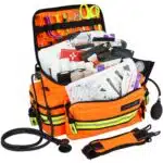 Orange EMT bag with reflective trim, filled with first aid supplies