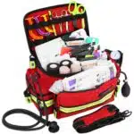 Red EMT bag with reflective trim, filled with first aid supplies