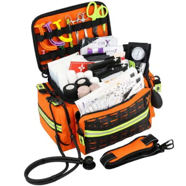 orange emt trauma kit filled with medical supplies, stethoscope and blood pressure monitor