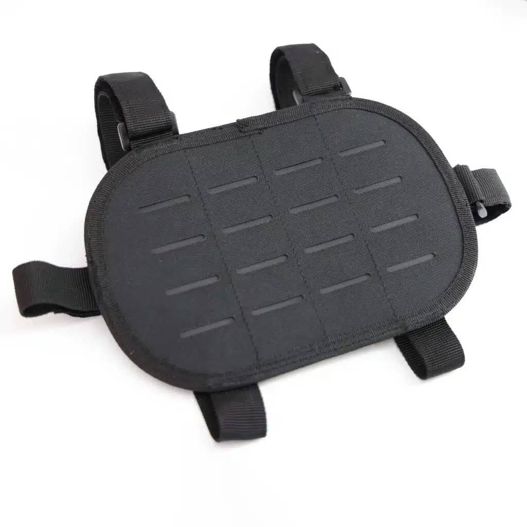 Black padded chest harness with laser-cut MOLLE panel and adjustable webbing straps