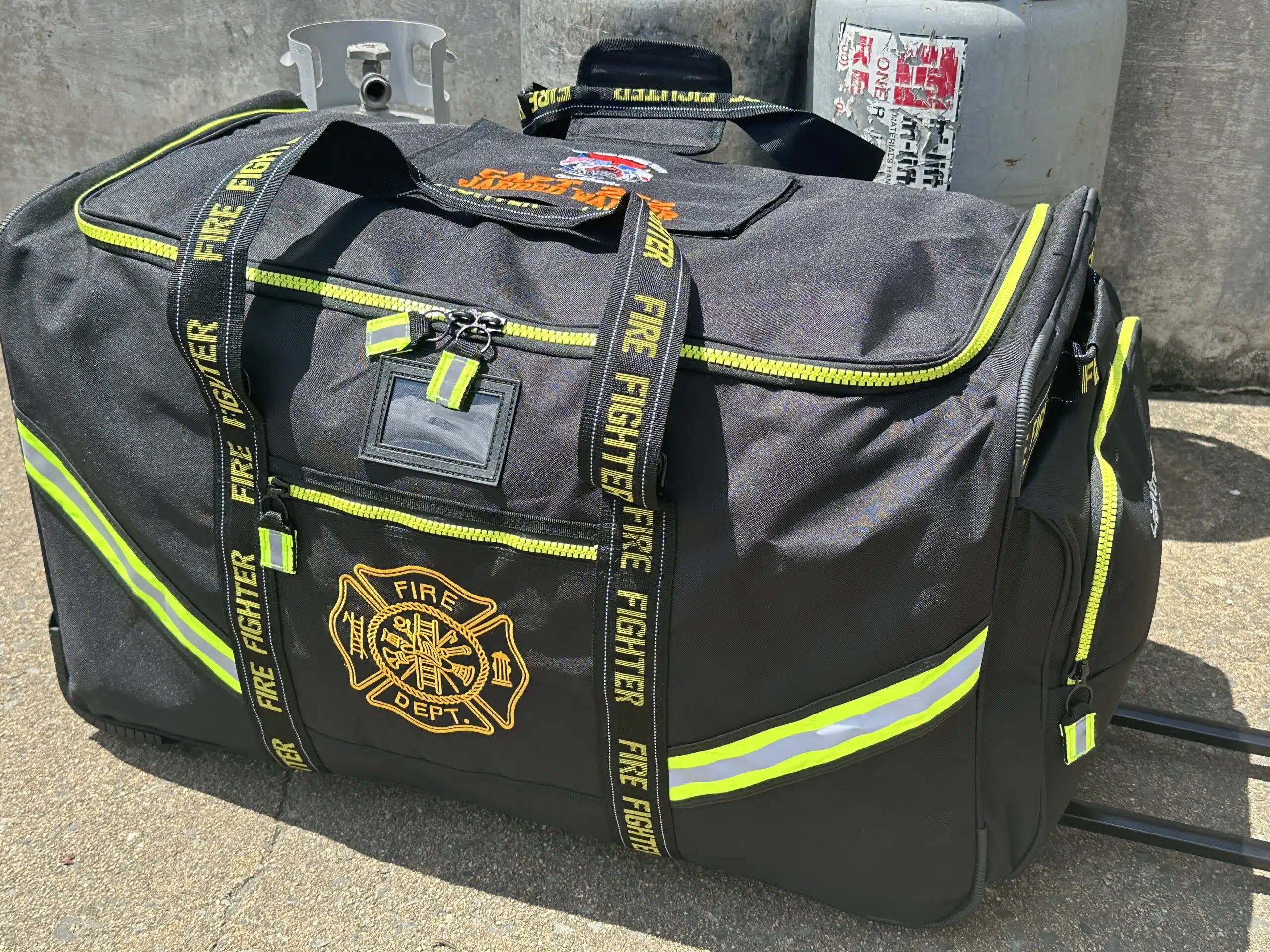 IMG_6692 One standout is the Lightning X LXFB99-G, a turnout gear bag specifically engineered for containment and health protection. It’s not just waterproof; it’s airtight, thanks to heat-welded seams that eliminate needle holes where air or contaminants could escape. Why is this important? Because the gear you wear into a burning building doesn’t stop being dangerous after the fire is out. Off-gassing from used turnout gear releases volatile organic compounds (VOCs) and toxic residues, including known carcinogens like benzene, formaldehyde, and polycyclic aromatic hydrocarbons (PAHs). These chemicals can linger on gear for hours and be absorbed through skin contact or inhaled. The impact is staggering. According to the International Association of Fire Fighters (IAFF), cancer is now the leading cause of death among firefighters. Nearly 75% of line-of-duty deaths in recent years are attributed to occupational cancer. One study by the CDC and NIOSH found that firefighters have a 14% higher risk of dying from cancer compared to the general population, and that risk only increases with repeated exposure to toxic substances trapped in unwashed gear. The LXFB99-G helps limit this exposure by sealing contaminated gear until it can be professionally cleaned and decontaminated, keeping those toxins out of your vehicle, your station, and your lungs. Stories of firefighters being diagnosed with cancer in their 30s and 40s, some just a few years into their careers, have become tragically common. Departments across the country are now adopting new SOPs to handle contaminated gear, including the use of containment bags. As one veteran chief put it, “We used to wear our dirty gear like a badge of honor. Now we realize we were wearing a warning sign.”