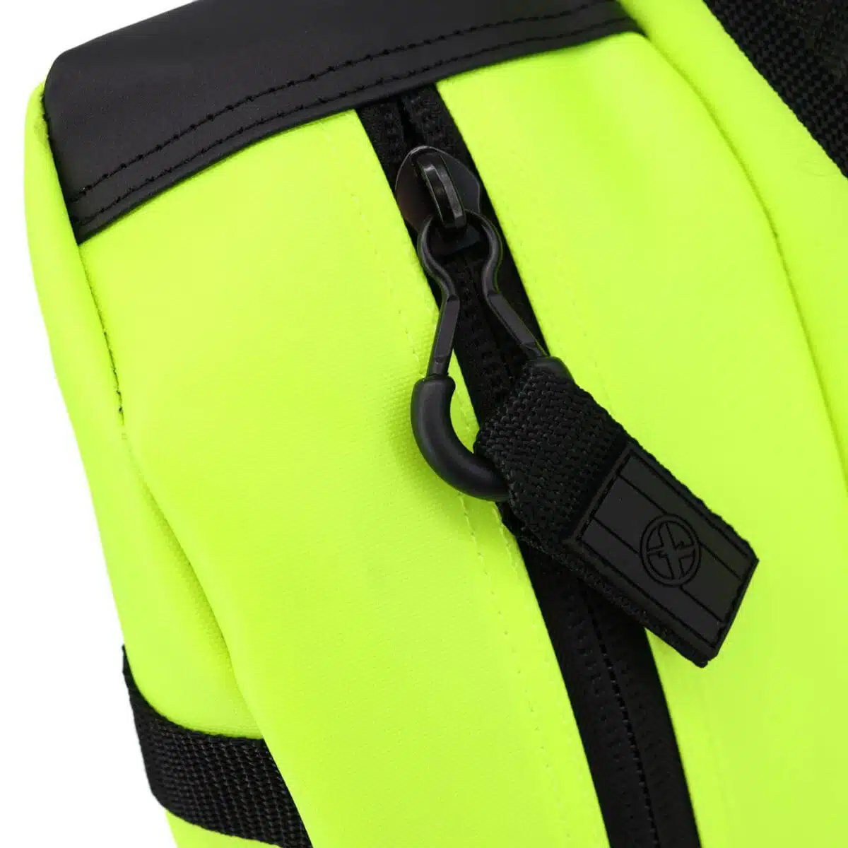 Fluorescent yellow panel with a black molded zipper pull and webbing tab against black trim