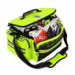 Hi-vis fluorescent yellow stocked first responder bag angled to show packed trauma supplies