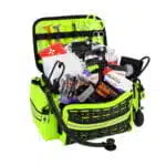 Hi-vis yellow first responder trauma bag, open and packed with chest seals, bandages and hemostatic gauze