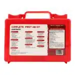 Back of a red hi-vis hard-case first aid kit showing the printed 214-piece contents list and wall-mount keyholes