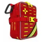 Red soft-shell first aid kit, angled to reveal the side panel, with a hi-vis cross, MOLLE slots and reflective stripe