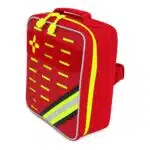 Red soft-shell first aid kit, closed front-on with a hi-vis yellow cross, rows of MOLLE slots and a reflective stripe
