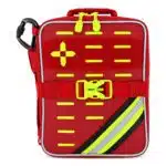 Red soft-shell first aid kit, closed three-quarter with hi-vis cross, laser-cut MOLLE slots and reflective stripe