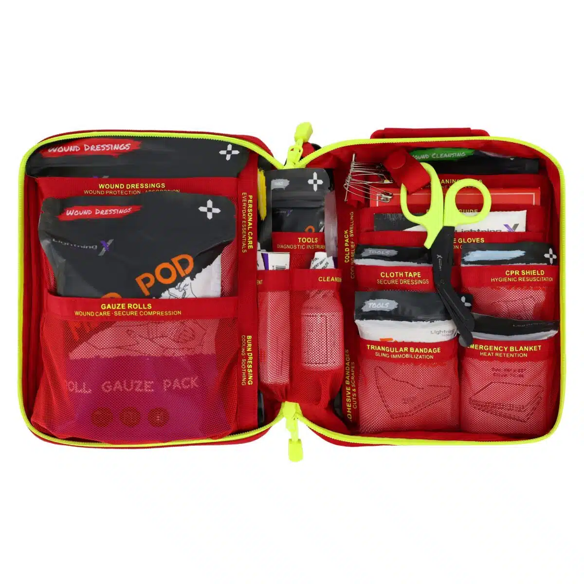 Red soft-shell first aid kit opened flat, revealing color-coded pouches and supplies in labeled mesh pockets