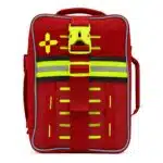 Red soft-shell first aid kit, closed three-quarter view with a hi-vis yellow cross, MOLLE slots and reflective stripe