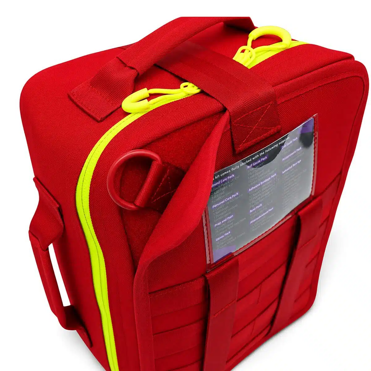 Red soft-shell first aid kit, three-quarter view showing the FIRST AID KIT side print, hi-vis cross and MOLLE slots