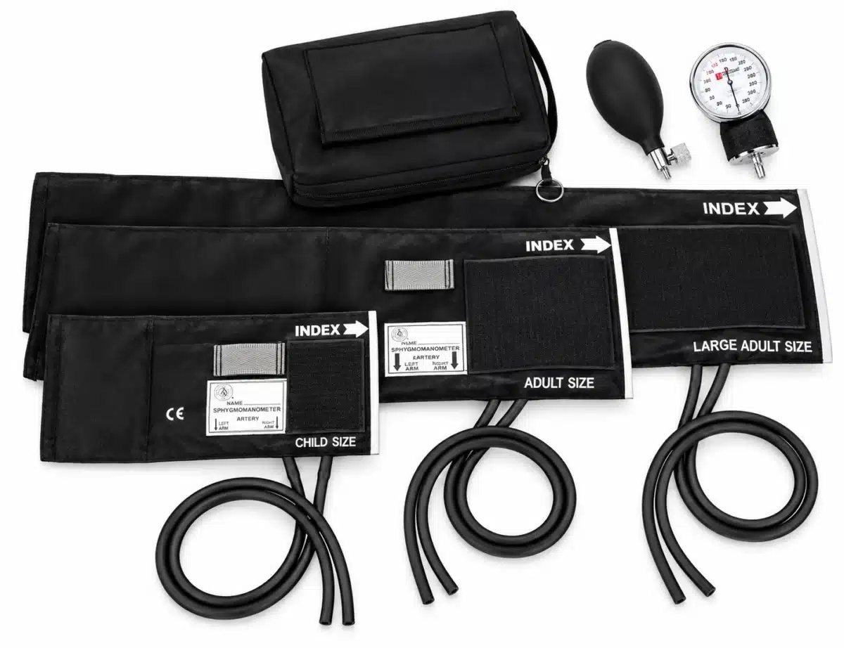 Lightning X 3-in-1 aneroid blood pressure kit laid out: zippered carry case, inflation bulb, gauge and child, adult and large adult cuffs with tubing